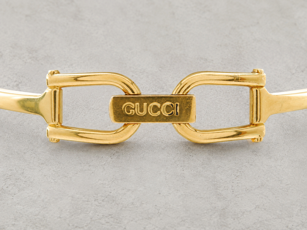 GUCCI／1500L クォーツ 黒文字盤 ゴールド バングルウォッチ